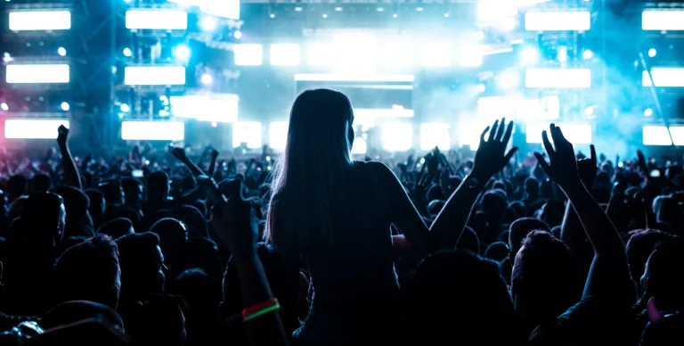 1-rear-view-carefree-fans-having-fun-music-festival-front-illuminated-stage-night